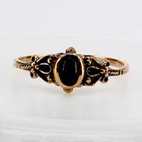 Bronzering Ornament mit schwarzem Onyx 